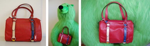 Diese rote Handtasche kann gewinnen, wer beim Gewinnspiel die richtige Frage ankreuzt. Gewinnspielkarten gibt es zum Beispiel am 23. März 2012 von 11-14 Uhr beim Aktionsstand der hessischen GRÜNEN auf dem Wiesbadener Schlossplatz.